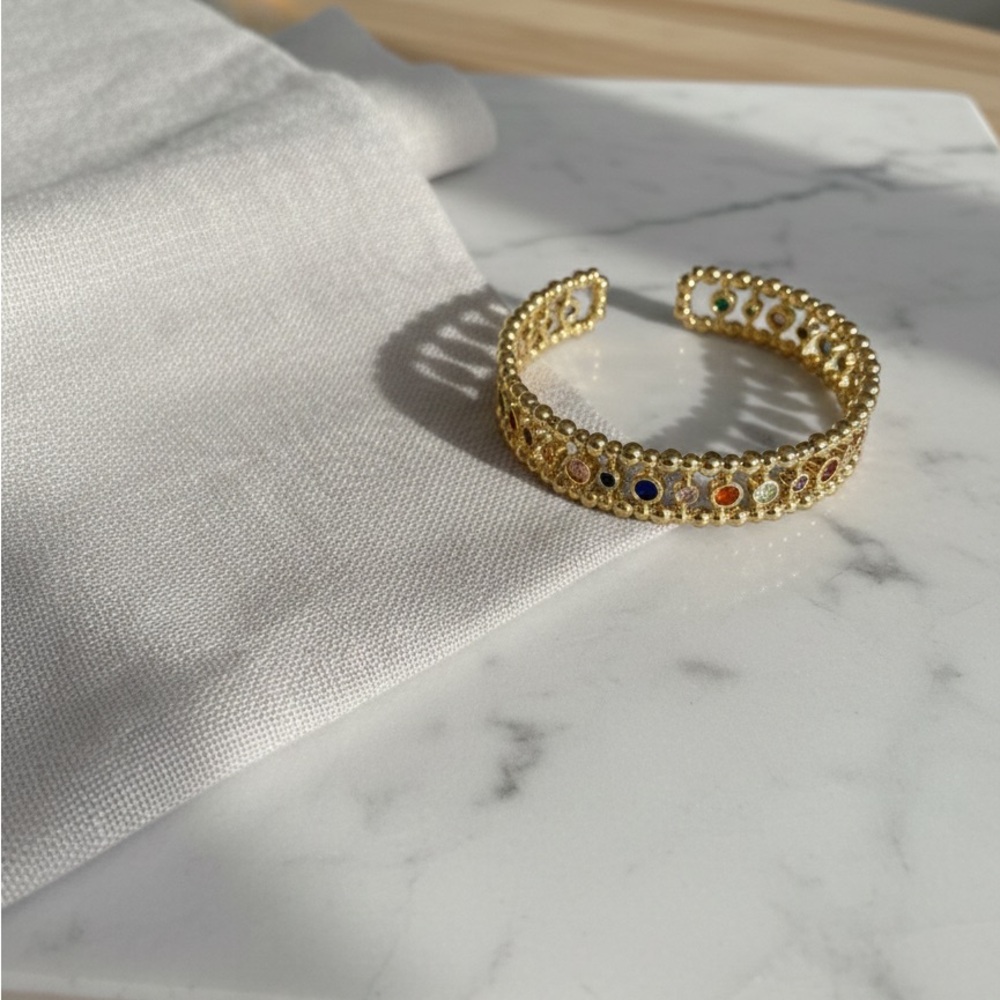 Elegant Gold-Tone Cuff Bracelet with Multicolor Accents